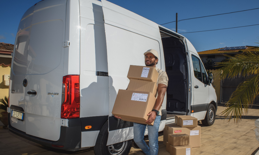 photo of van with man providing small parcel shipping solutions